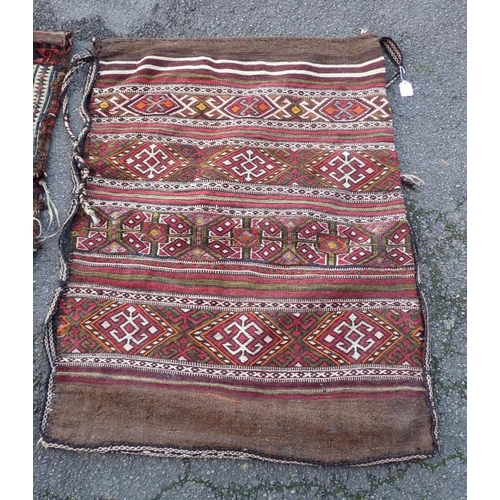 739 - A TURKISH BERGAMA CHUVAL BAG

83 x 108cm and a Baluch saddle bag