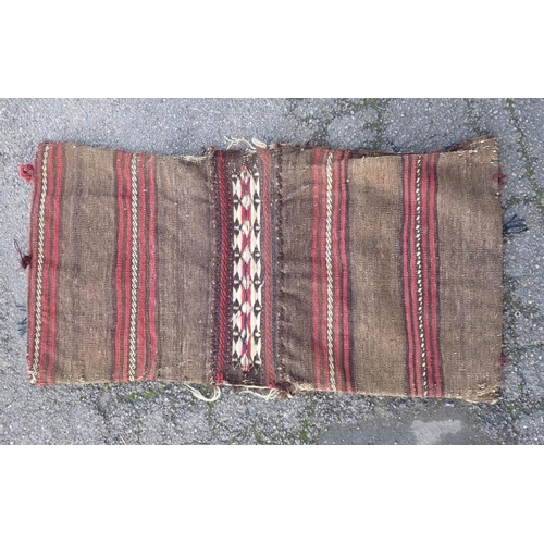 739 - A TURKISH BERGAMA CHUVAL BAG

83 x 108cm and a Baluch saddle bag