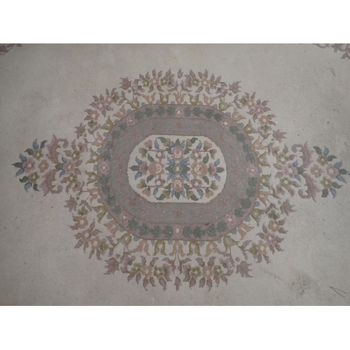 742 - A LARGE CREAM GROUND CHINESE RUG

273 x 370cm