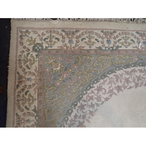 742 - A LARGE CREAM GROUND CHINESE RUG

273 x 370cm