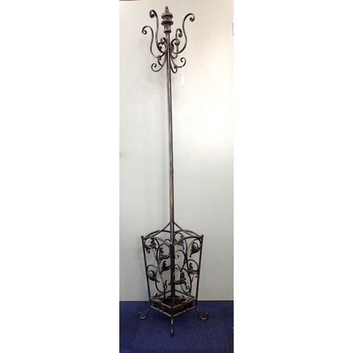 743 - A DECORATIVE CAST METAL COAT, HAT AND UMBELLA STAND

184cm high