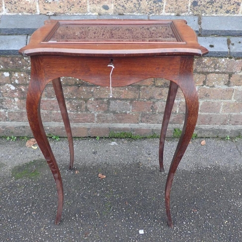 749 - A LATE 19th CENTURY ROSEWOOD BIJOUTERIE CABINET

of small proportions, on slender cabriole legs, wit... 