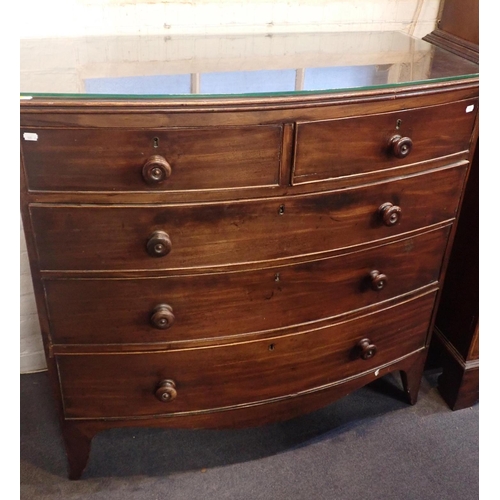 764 - A 19th CENTURY MAHOGANY BOWFRONT CHEST OF DRAWERS

with turned knobs, on splayed bracket feet 108cm ... 