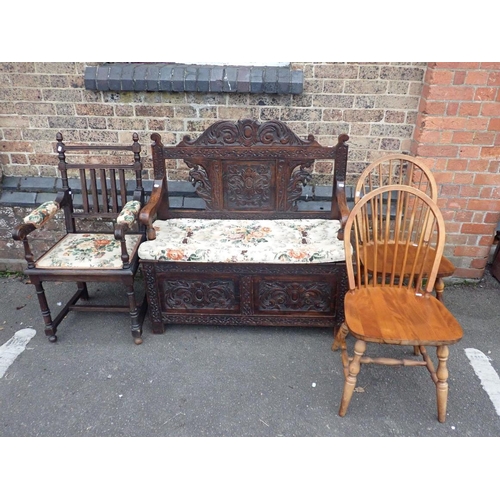 773 - A VICTORIAN CARVED OAK HALL BENCH

with lift-up seat 104cm wide (small scroll missing). a similar oa... 