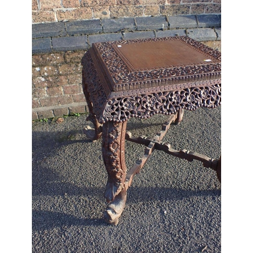 800 - A 19th CENTURY ANGLO-INDIAN CENTRE TABLE

with profusely carved frieze 60 x 60cm