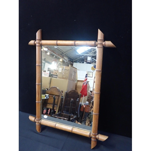 803 - A FRENCH BIRCH FAUX-BAMBOO FRAMED MIRROR

76 x 61cm