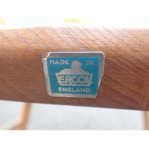 820 - ERCOL; A PAIR OF 'COWHORN' ARMCHAIRS

with blue labels (some wear to finish)