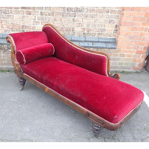 825 - AN EARLY VICTORIAN ROSEWOOD CHAISE LONGUE

with scrolled end and back, on brass castors 180cm long