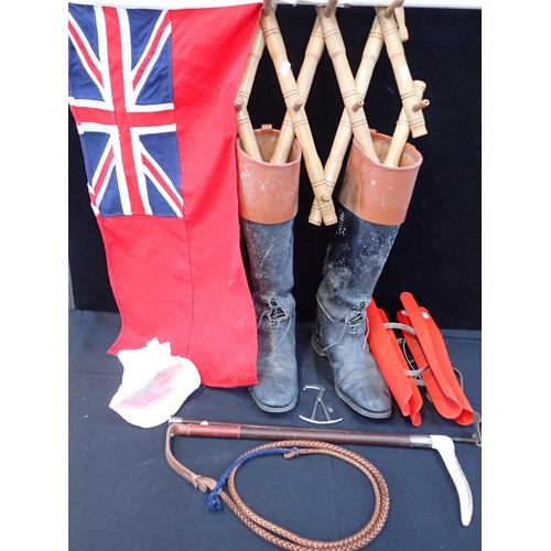 96 - A PAIR OF RIDING BOOTS SIZE 11

with riding whips, a seashell, a coat rack, a sewn merchant navy fla... 