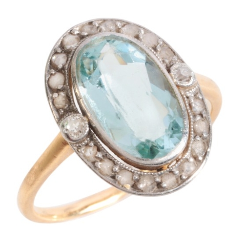 1 - AN AQUAMARINE AND DIAMOND CLUSTER RING

in 18ct gold and platinum, set with an oval cut aquamarine o... 