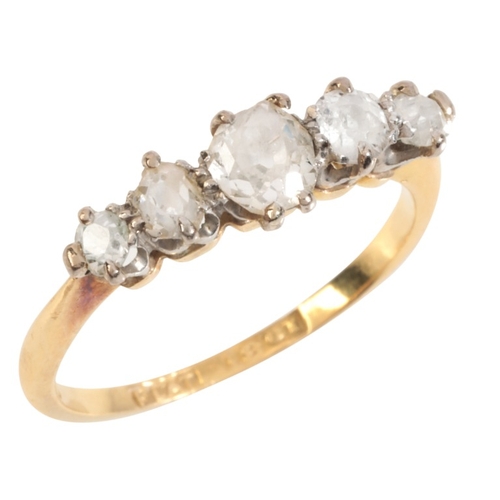 11 - A DIAMOND FIVE STONE RING

in 18ct gold and platinum, set with five old mine cut diamonds, totalling... 