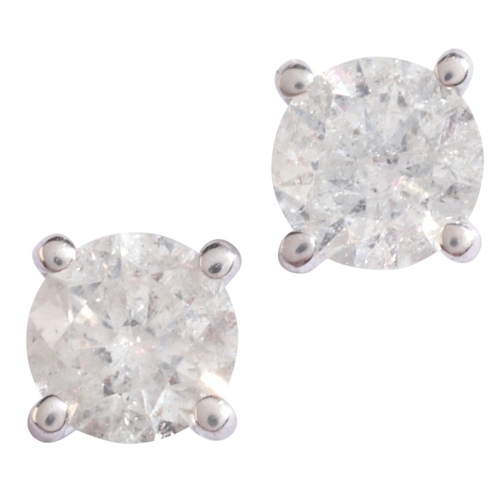 145 - A PAIR OF DIAMOND STUD EARRINGS

in 18ct white gold, each set with a round brilliant cut diamond, he... 