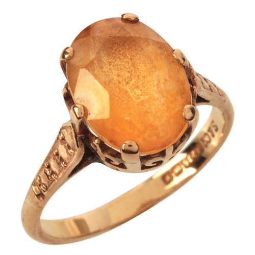 15 - A VINTAGE CITRINE SOLITAIRE RING

in 9ct gold, set with an oval cut citrine of c.3.75 carats, held i... 