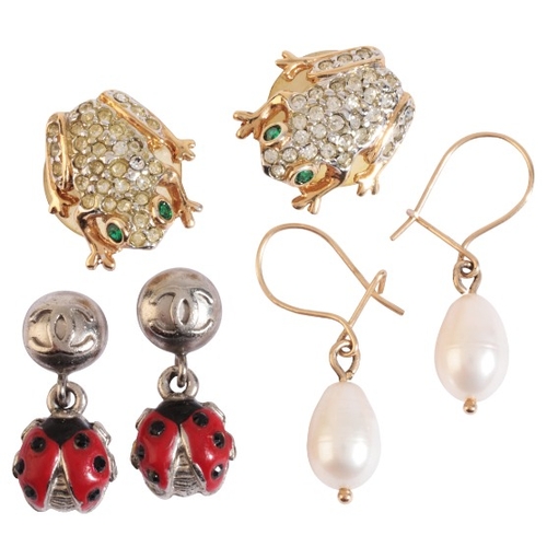 152 - A COLLECTION OF COSTUME EARRINGS

including a pair of Chanel ladybird studs earrings; together with ... 