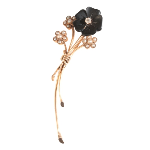 188 - A GEM-SET FLOWER BROOCH

in 14ct gold, designed as a stylised bouquet, the principal flower set with... 