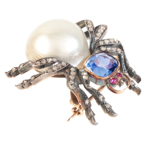 206 - AN ANTIQUE CEYLON NO HEAT SAPPHIRE, PEARL AND DIAMOND SPIDER BROOCH

in silver on gold, set with a c... 