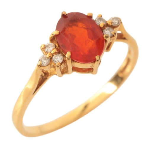 21 - A FIRE OPAL AND DIAMOND RING

in 18ct gold, set with an oval cut fire opal of c.0.90 carats, flanked... 