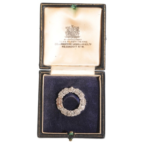 232 - A DIAMOND WREATH BROOCH

in 9ct and 15ct gold, set throughout with old mine cut and rose cut diamond... 