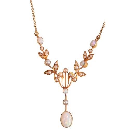 301 - AN ANTIQUE EDWARDIAN OPAL AND PEARL PENDANT NECKLACE

in 15ct gold, comprising a stylised floral pen... 