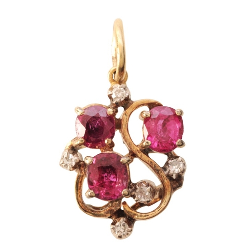 303 - A RUBY AND DIAMOND PENDANT

in 14ct gold, set with three oval cut rubies, totalling c.1.00 carats, a... 