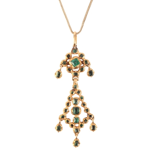 323 - AN EMERALD PENDANT NECKLACE

in 18ct gold, set throughout with step cut emeralds over an articulated... 