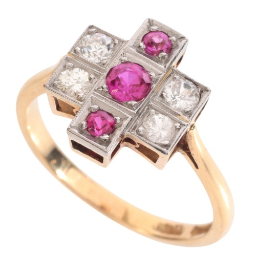 40 - A RUBY AND DIAMOND DRESS RING

in 18ct gold and platinum, set with three graduating round cut rubies... 