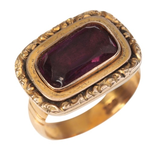 49 - AN ANTIQUE AND LATER GARNET MOURNING RING

in 9ct gold, the antique Victorian head set with a cushio... 