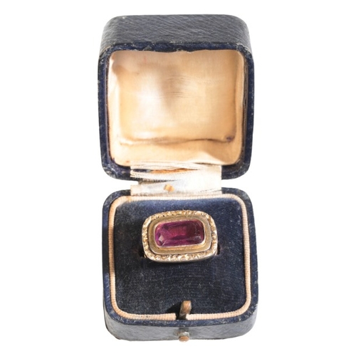 49 - AN ANTIQUE AND LATER GARNET MOURNING RING

in 9ct gold, the antique Victorian head set with a cushio... 