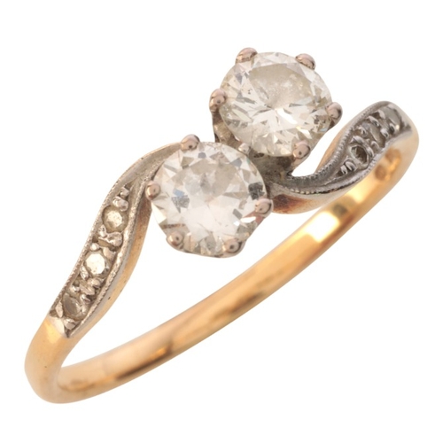 52 - A VINTAGE DIAMOND TOI-ET-MOI RING

in 18ct gold, set with two transitional cut diamonds, totalling c... 