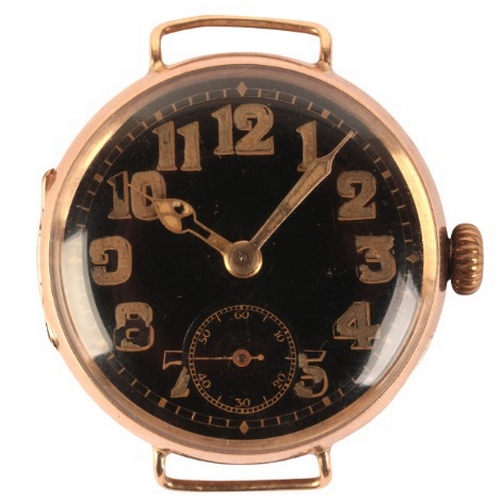 565 - A GENTLEMAN'S 9CT GOLD TRENCH WATCH

with manual wind movement, the black dial with gold Arabic nume... 