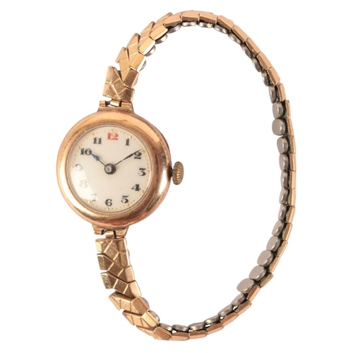 568 - A LADY'S 9CT GOLD WRISTWATCH

with manual wind movement, the white enamel dial with black Arabic num... 