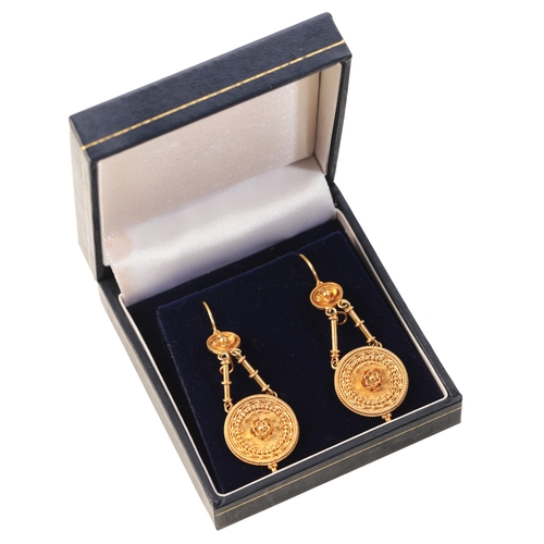 149 - A PAIR OF ANTIQUE ETRUSCAN REVIVAL DROP EARRINGS

in 9ct gold, each comprising concave disk with flo... 