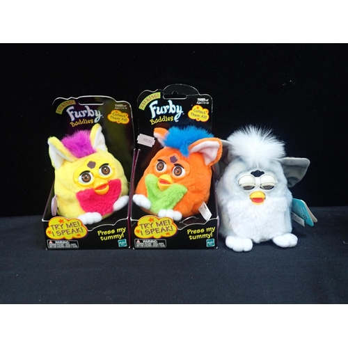 115 - FOUR BOXED TALKING FURBY BUDDIES

together with one Furby baby, and three boxed Furby Sleepy Time Be... 