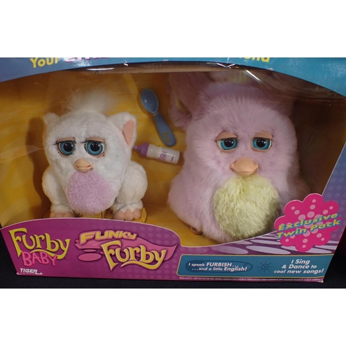 119 - A COLLECTION OF BOXED FURBIES

including a Fuby Baby and Funky Furby in an 