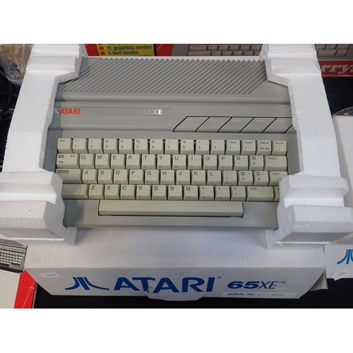 123 - AN ATARI 65XE HOME COMPUTER OUTFIT

serial no.A1 & A3 060475, in original boxes and seemingly little... 