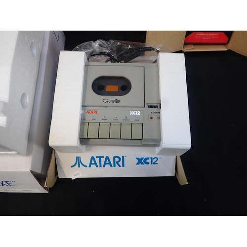 123 - AN ATARI 65XE HOME COMPUTER OUTFIT

serial no.A1 & A3 060475, in original boxes and seemingly little... 