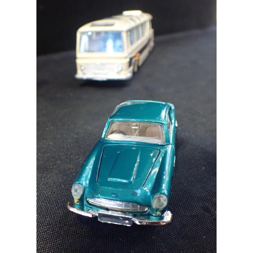 128 - DINKY TOYS 'ASTON MARTIN' DIECAST MODEL

unboxed in good condition but play worn, with three other D... 