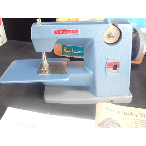 137 - A VULCAN CHILD'S SEWING MACHINE

boxed, with a a Chad Valley  Mary Lou electric toy washer and spin ... 