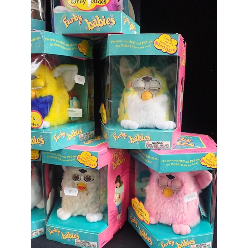 145 - NINE ORIGINAL FURBY BABIES

all tagged Furby originals (some wear to boxes) (9)