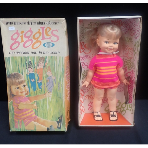 147 - A 'TIPPY TUMBLES' DOLL BY PALITOY

with a 'Giggles' doll by Ideal