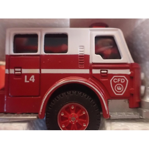 149 - CORGI 'SIMON SNORKEL' FIRE ENGINE No:1127, IN ORIGINAL BOX

with three other boxed corgi fire engine... 