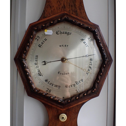 156 - A 19th CENTURY ROSEWOOD CASED WHEEL BAROMETER BY WEST

London, the octagonal silvered dial with carv... 