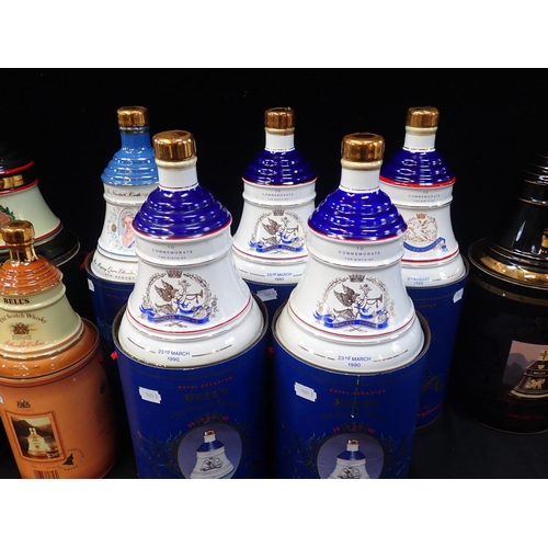 174 - A COLLECTION OF BELLS WHISKY DECANTERS, ALL SEALED AND BOXED

Bells Royal Reserve (Blue)
Prince Andr... 