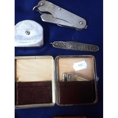 194 - A TELEPHONE DIAL POWDER COMPACT

with a collection of sundries to including a cased lighter, pen kni... 