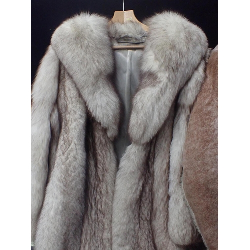 21 - A LADIES VINTAGE FUR FULL LENGTH COAT

with grey silk lining, a Nurseys sheepskin coat and a fur muf... 