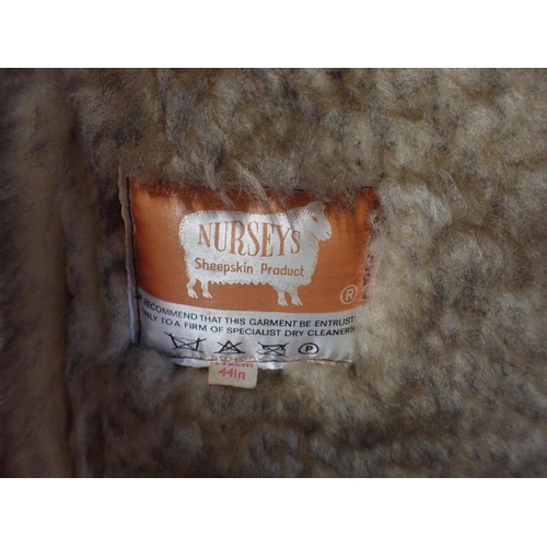 21 - A LADIES VINTAGE FUR FULL LENGTH COAT

with grey silk lining, a Nurseys sheepskin coat and a fur muf... 