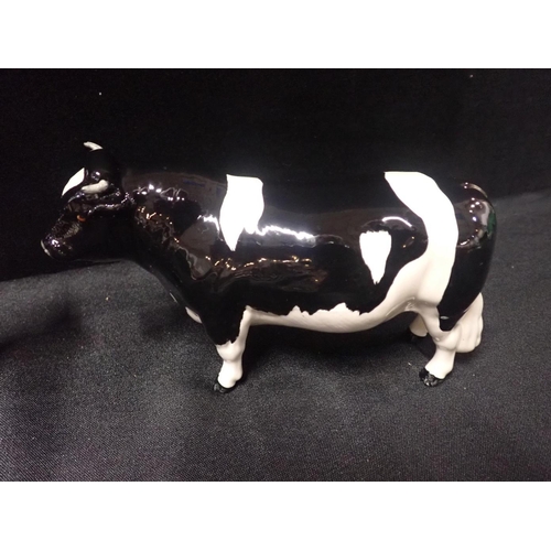 218 - THREE BESWICK POTTERY FIGURES OF BULLS

comprising Friesian, Charolais and Jersey 'Dunsley Coy Boy' ... 