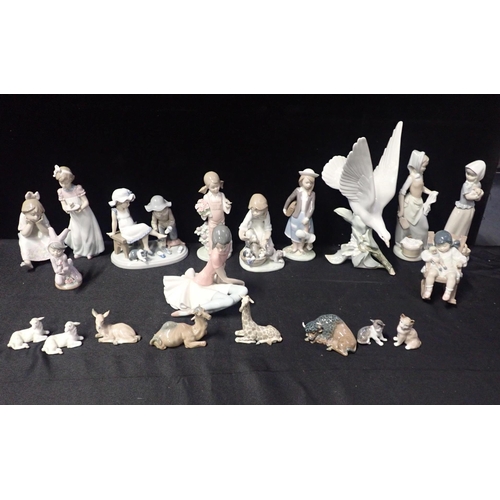 221 - A COLLECTION OF LLADRO FIGURINES
and Nao figures, including animals