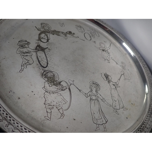 256 - A VICTORIAN SILVER-PLATED TRAY WITH KATE GREENAWAY DESIGNED FIGURES ENGRAVED

25.5cm dia, a brass ov... 