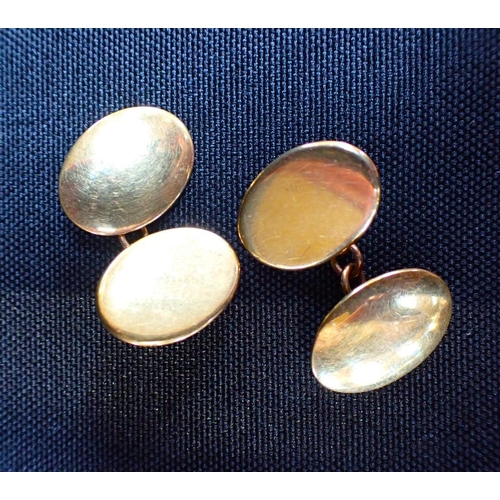 305 - A PAIR OF 18ct GOLD PLAIN OVAL CUFFLINKS

maker GB